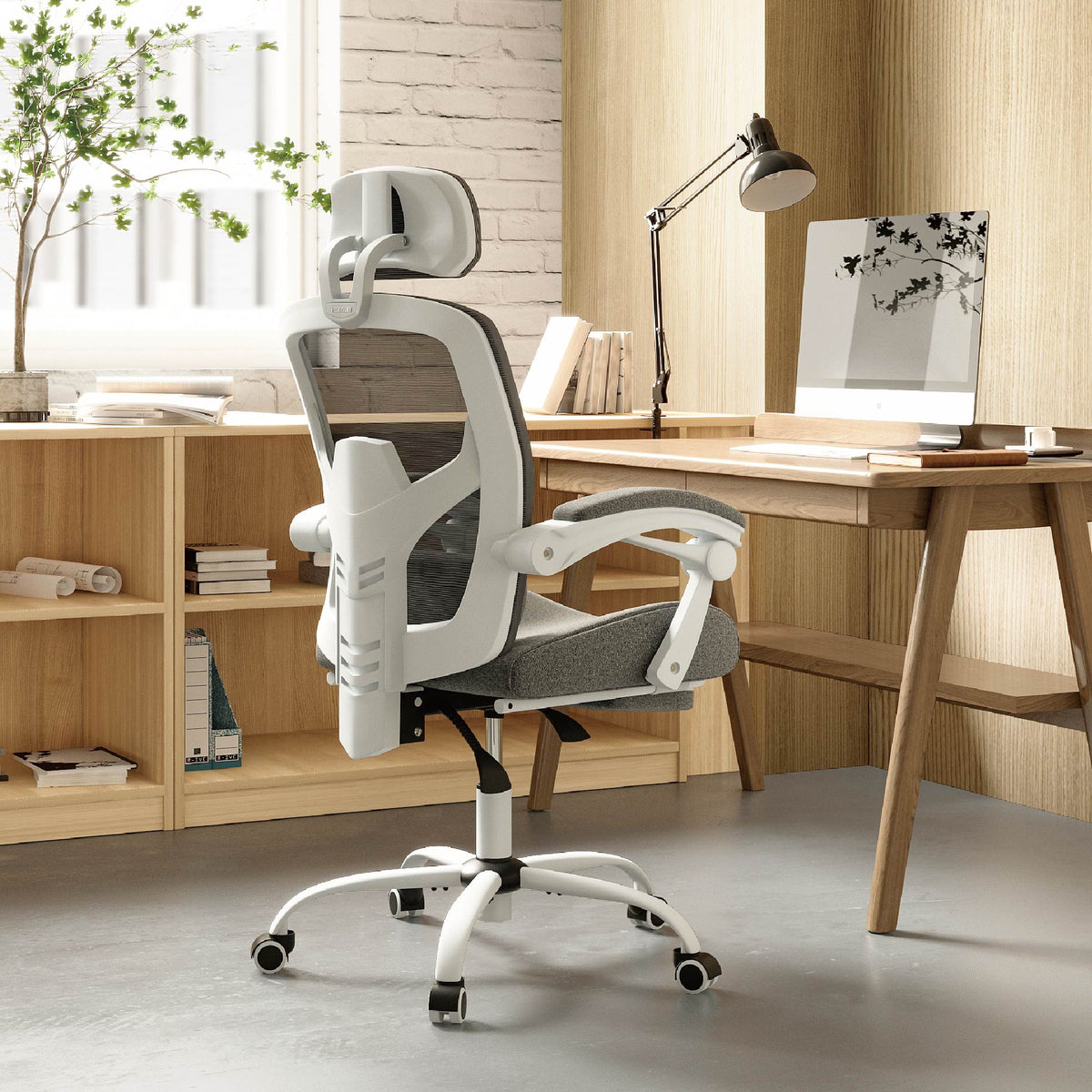 Retractable Footrest Ergonomic Swivel Office Chair With Lumbar Support Pillow And Padded Armrests - Nook & Nest