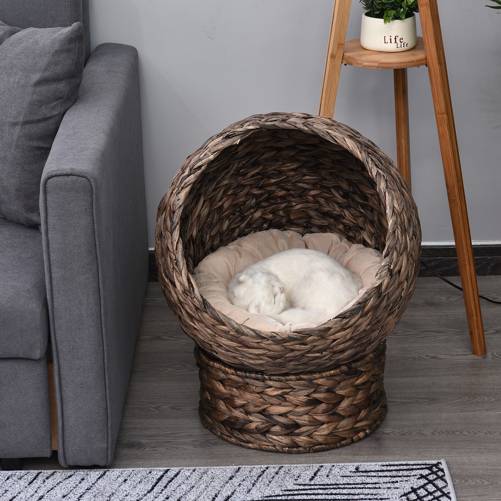 Handwoven Elevated Cat Bed: Cozy Wicker Cat Egg Chair with Soft Cushion and Rotating Basket - Nook & Nest